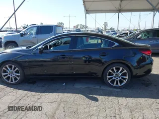 2015 Mazda 6 i Grand Touring with VIN JM1GJ1W61F1165006, listed as a IAAI auction lot 41988778 with 113,226 mi miles and . Bid and sale history available at carsss.com. Image 14.