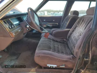 1990 Mercury Grand Marquis z VIN 2MECM79F8LX618527, wystawiony jako Copart lot #46685505 z przebiegiem 65 316 mil mil oraz Tytuł czysty. Historia ofert i sprzedaży dostępna na DreamBid. Obrazek 7.