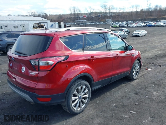 2017 Ford Escape Titanium with VIN 1FMCU0JD9HUC71738, listed as a IAAI auction lot 41673228 with 173,615 mi miles. Bid and sale history available at carsss.com. Image 4.