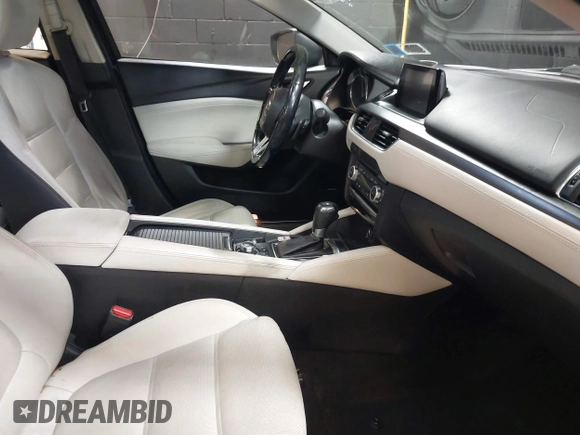 2017 Mazda 6 Grand Touring with VIN JM1GL1W51H1101519, listed as a IAAI auction lot 42132215 with 145,796 mi miles. Bid and sale history available at carsss.com. Image 5.