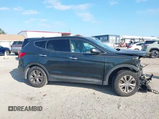 2013 Hyundai Santa Fe Sport z VIN 5XYZT3LB8DG061870, wystawiony jako IAAI lot #42029905 z przebiegiem 79 036 mil mil oraz . Historia ofert i sprzedaży dostępna na DreamBid. Obrazek 14.