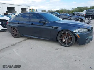 2013 BMW M5 with VIN WBSFV9C59DD096774, listed as a IAAI auction lot 41608286 with NaN miles. Bid and sale history available at carsss.com. Image 1.