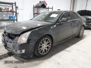 2013 Cadillac CTS Premium z VIN 1G6DS5E34D0103328, wystawiony jako IAAI lot #41501406 z przebiegiem 157 633 mil mil oraz . Historia ofert i sprzedaży dostępna na DreamBid. Obrazek 17.