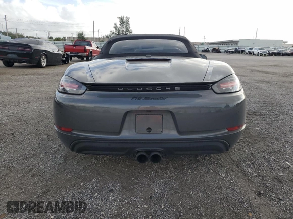 2017 Porsche 718 Boxster z VIN WP0CA2A8XHS221955, wystawiony jako Copart lot #39600404 z przebiegiem 52 979 mil mil oraz . Historia ofert i sprzedaży dostępna na DreamBid. Obrazek 6.