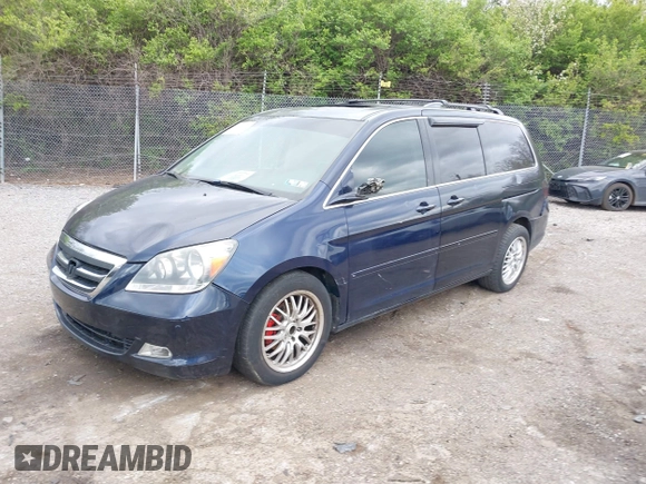 2007 Honda Odyssey EX-L with VIN 5FNRL38737B031255, listed as a IAAI auction lot 42040035 with 233,369 mi miles. Bid and sale history available at carsss.com. Image 2.