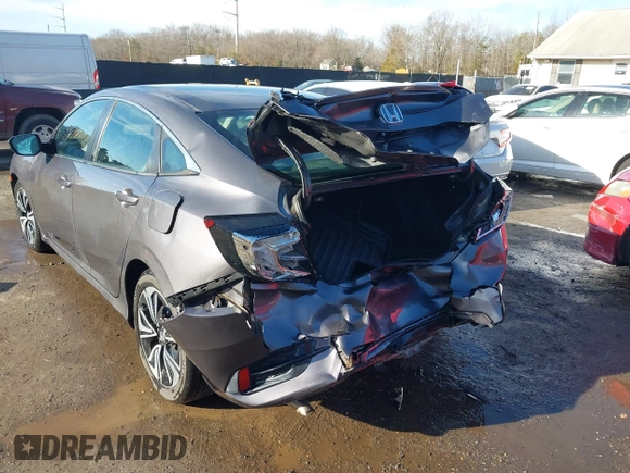 2017 Honda Civic Sedan EX-L with VIN 2HGFC1F70HH633263, listed as a IAAI auction lot 41511642 with 65,769 mi miles. Bid and sale history available at carsss.com. Image 6.