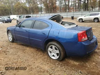 2009 Dodge Charger R/T with VIN 2B3KA53T69H557787, listed as a Copart auction lot 83871294 with 176,653 mi miles and Salvage Title. Bid and sale history available at carsss.com. Image 2.