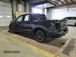 2020 Honda Ridgeline Sport with VIN 5FPYK3F16LB023763, listed as a Copart auction lot 71100094 with Not provided miles and Salvage title. Bid and sale history available at DreamBid. Image 2.