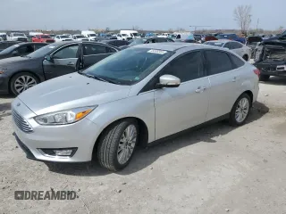 2017 Ford Focus Titanium с VIN 1FADP3J23HL347739, выставлен на аукционе Copart как лот 49385365 с пробегом 79 484 миль миль и Списание • Salvage title. История ставок и продаж доступна на DreamBid. Изображение 1.