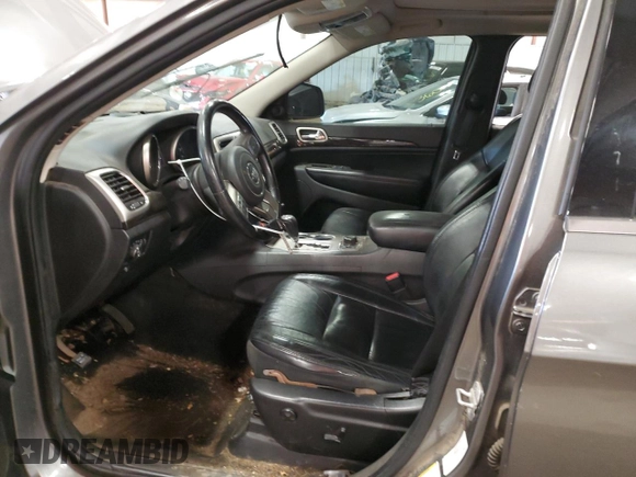 2012 Jeep Grand Cherokee Laredo with VIN 1C4RJFAT0CC226624, listed as a Copart auction lot 77114564 with 178,659 mi miles and Clean Title. Bid and sale history available at carsss.com. Image 7.