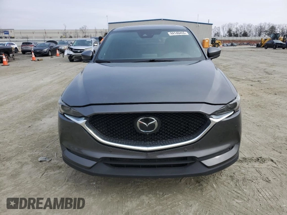 2019 Mazda CX-5 Signature with VIN JM3KFBEY3K0609305, listed as a Copart auction lot 44146455 with 33,104 mi miles and Salvage Title. Bid and sale history available at carsss.com. Image 5.