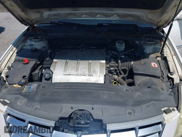 2006 Cadillac DTS 1SD z VIN 1G6KD57Y06U208812, wystawiony jako IAAI lot #42233924 z przebiegiem 120 244 mil mil oraz . Historia ofert i sprzedaży dostępna na DreamBid. Obrazek 10.
