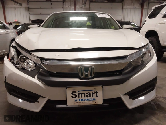 2018 Honda Civic EX with VIN 19XFC2F74JE005647, listed as a IAAI auction lot 41938607 with 90,263 mi miles and . Bid and sale history available at DreamBid. Image 13.