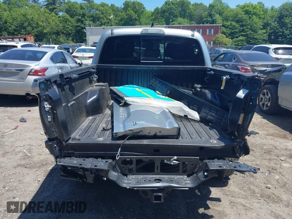 2023 Toyota Tacoma SR with VIN 3TYCZ5AN2PT141576, listed as a IAAI auction lot 42492127 with 43,431 mi miles and . Bid and sale history available at DreamBid. Image 17.