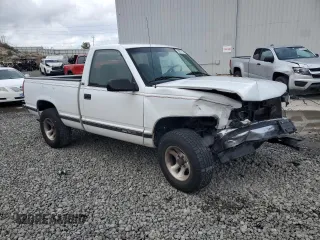 1995 GMC Sierra 1500 with VIN 1GTEK14K0SZ563517, listed as a Copart auction lot 50977315 with 280,549 mi miles and Salvage Title. Bid and sale history available at DreamBid. Image 4.