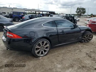 2013 Jaguar XK with VIN SAJWA4FB3DLB50331, listed as a Copart auction lot 66573384 with 109,887 mi miles and Salvage Title. Bid and sale history available at carsss.com. Image 3.