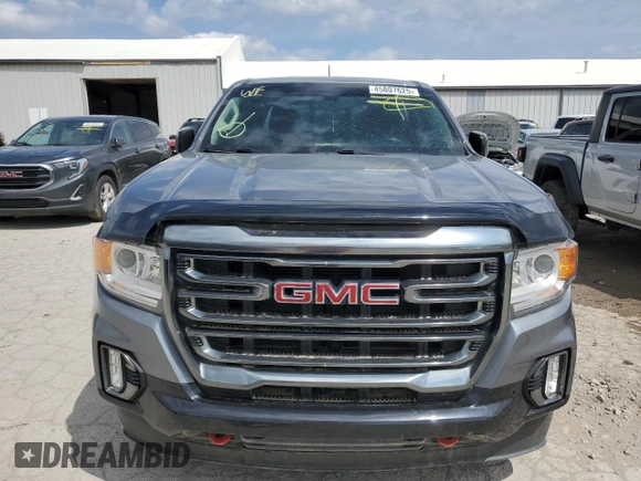 2021 GMC Canyon 4WD AT4 w/Cloth with VIN 1GTG6FEN9M1121579, listed as a Copart auction lot 45807625 with 0 mi miles and Salvage Title. Bid and sale history available at carsss.com. Image 5.