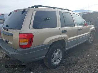 2000 Jeep Grand Cherokee Laredo with VIN 1J4GW48S4YC256978, listed as a IAAI auction lot 40652709 with 117,859 mi miles and . Bid and sale history available at DreamBid. Image 4.