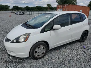 2013 Honda Fit with VIN JHMGE8H35DC005128, listed as a Copart auction lot 52375995 with 163,172 mi miles and Non Repairable. Bid and sale history available at carsss.com. Image 1.