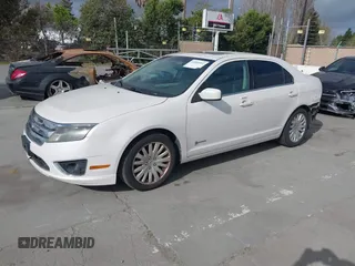 2010 Ford Fusion Hybrid with VIN 3FADP0L36AR140242, listed as a IAAI auction lot 41895012 with 236,943 mi miles and . Bid and sale history available at DreamBid. Image 2.