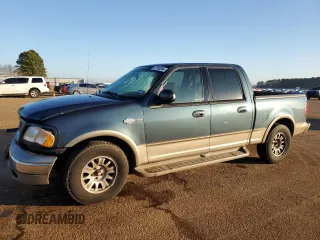 2002 Ford F-150 XLT with VIN 1FTRW07L82KB73472, listed as a Copart auction lot 87380264 with 183,807 mi miles and Salvage Title. Bid and sale history available at carsss.com. Image 1.