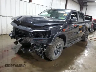 2019 Ram 1500 Rebel z VIN 1C6SRFLT6KN703090, wystawiony jako Copart lot #49645675 z przebiegiem Nie podano mil oraz Szkoda całkowita • Salvage title. Historia ofert i sprzedaży dostępna na DreamBid. Obrazek 1.