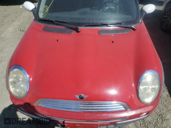 2004 MINI Hardtop with VIN WMWRC33474TJ53569, listed as a Copart auction lot 72429454 with 154,713 mi miles and Salvage Title. Bid and sale history available at DreamBid. Image 11.