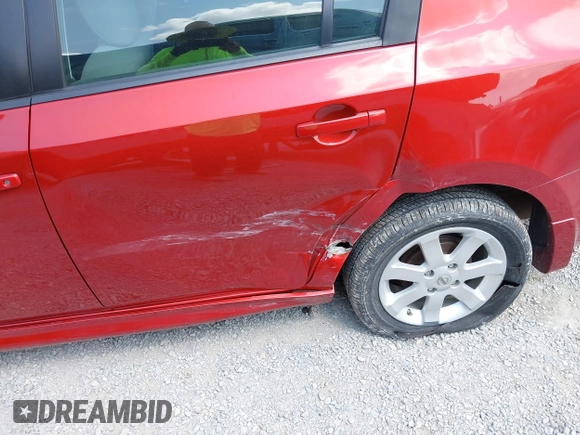 2011 Nissan Sentra S with VIN 3N1AB6APXBL677238, listed as a IAAI auction lot 42402632 with 52,677 mi miles and . Bid and sale history available at DreamBid. Image 6.