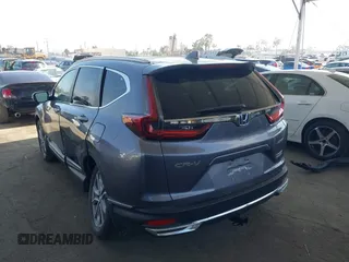 2020 Honda CR-V Touring z VIN 7FART6H91LE000684, wystawiony jako IAAI lot #42504731 z przebiegiem 49 100 mil mil oraz . Historia ofert i sprzedaży dostępna na DreamBid. Obrazek 3.