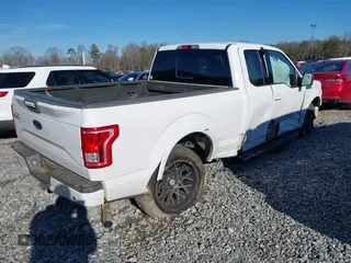 2015 Ford F-150 XL with VIN 1FTEX1CP2FKD90662, listed as a IAAI auction lot 41273874 with 138,768 mi miles. Bid and sale history available at carsss.com. Image 4.