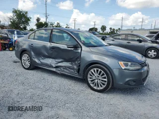 2014 Volkswagen Jetta TDI w/Premium with VIN 3VWLL7AJ7EM436916, listed as a Copart auction lot 58238385 with 103,265 mi miles and Salvage title. Bid and sale history available at DreamBid. Image 4.