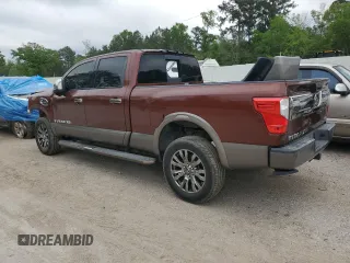 2016 Nissan Titan Platinum Reserve z VIN 1N6BA1F27GN502924, wystawiony jako Copart lot #51345105 z przebiegiem 90 215 mil mil oraz Szkoda całkowita • Salvage title. Historia ofert i sprzedaży dostępna na DreamBid. Obrazek 2.