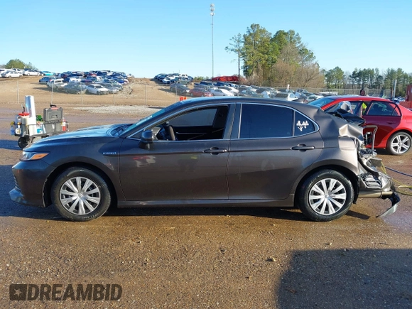 2019 Toyota Camry Hybrid LE z VIN 4T1B31HK4KU516123, wystawiony jako IAAI lot #41733410 z przebiegiem 98 273 mil mil oraz . Historia ofert i sprzedaży dostępna na DreamBid. Obrazek 14.