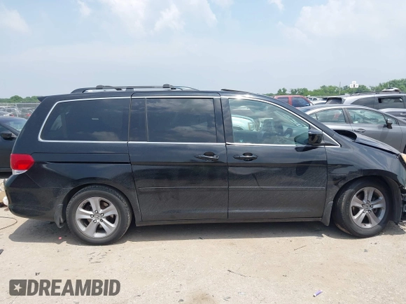 2010 Honda Odyssey Touring с VIN 5FNRL3H90AB070720, выставлен на аукционе IAAI как лот 42335181 с пробегом 145 205 миль миль и . История ставок и продаж доступна на DreamBid. Изображение 14.