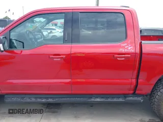 2023 Ford F-150 Lightning Pro with VIN 1FTVW1EL8PWG33656, listed as a IAAI auction lot 42260659 with 22,490 mi miles and . Bid and sale history available at DreamBid. Image 14.