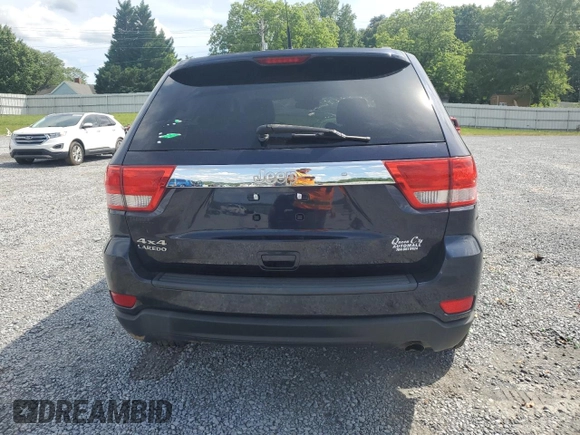 2011 Jeep Grand Cherokee Laredo with VIN 1J4RR4GG7BC515001, listed as a Copart auction lot 56432905 with 143,181 mi miles and Salvage title. Bid and sale history available at DreamBid. Image 6.