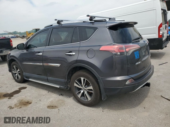 2016 Toyota RAV4 XLE with VIN 2T3RFREV0GW412875, listed as a Copart auction lot 59497545 with 226,604 mi miles and Salvage title. Bid and sale history available at DreamBid. Image 2.