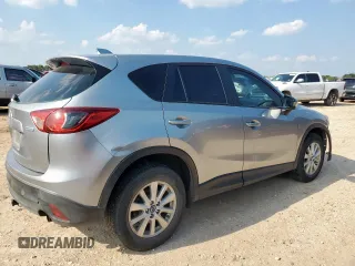 2013 Mazda CX-5 Sport with VIN JM3KE2BE5D0129797, listed as a Copart auction lot 58051185 with 200,712 mi miles and Salvage title. Bid and sale history available at DreamBid. Image 3.