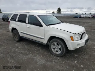 2007 Jeep Grand Cherokee Laredo with VIN 1J8GR48K17C638499, listed as a Copart auction lot 49649565 with 195,000 mi miles and Salvage Title. Bid and sale history available at carsss.com. Image 4.