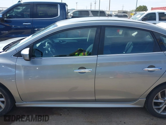 2013 Nissan Sentra SR z VIN 3N1AB7AP5DL772122, wystawiony jako IAAI lot #41945779 z przebiegiem 155 195 mil mil oraz . Historia ofert i sprzedaży dostępna na DreamBid. Obrazek 14.