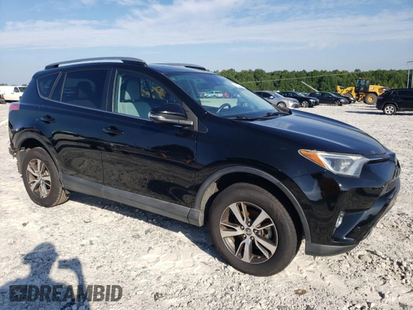 2017 Toyota RAV4 XLE with VIN 2T3WFREV9HW347299, listed as a Copart auction lot 62237864 with 103,392 mi miles and Salvage Title. Bid and sale history available at DreamBid. Image 4.