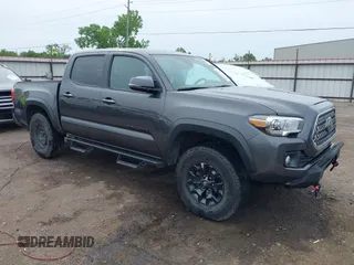 2019 Toyota Tacoma SR with VIN 5TFCZ5AN8KX194927, listed as a IAAI auction lot 42097215 with 72,307 mi miles and . Bid and sale history available at DreamBid. Image 1.