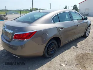 2012 Buick LaCrosse Premium 2 z VIN 1G4GF5E30CF119175, wystawiony jako IAAI lot #42132708 z przebiegiem 145 535 mil mil oraz . Historia ofert i sprzedaży dostępna na DreamBid. Obrazek 4.