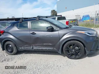2021 Toyota C-HR LE with VIN JTNKHMBX1M1120212, listed as a IAAI auction lot 41975849 with 62,228 mi miles. Bid and sale history available at carsss.com. Image 14.