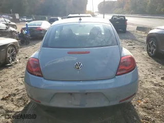 2012 Volkswagen Beetle 2.5L w/Sun PZEV with VIN 3VWJP7AT7CM617198, listed as a Copart auction lot 77875314 with 60,969 mi miles and Salvage Title. Bid and sale history available at carsss.com. Image 6.