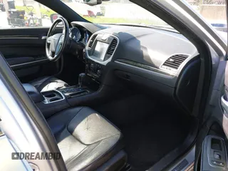 2012 Chrysler 300 with VIN 2C3CCAET2CH207796, listed as a IAAI auction lot 42029639 with 142,929 mi miles. Bid and sale history available at carsss.com. Image 5.