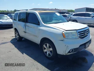 2015 Honda Pilot Touring with VIN 5FNYF3H92FB020766, listed as a IAAI auction lot 41983315 with 201,086 mi miles. Bid and sale history available at carsss.com. Image 1.