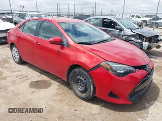 2018 Toyota Corolla L z VIN 5YFBURHE6JP755257, wystawiony jako IAAI lot #42155481 z przebiegiem 79 138 mil mil oraz . Historia ofert i sprzedaży dostępna na DreamBid. Obrazek 1.