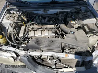 2003 Mazda Protege DX with VIN JM1BJ225730217866, listed as a Copart auction lot 53854075 with 105,782 mi miles and Salvage Title. Bid and sale history available at DreamBid. Image 11.