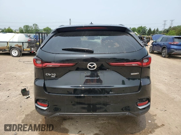 2025 Mazda CX-70 with VIN JM3KJDHD4S1115855, listed as a Copart auction lot 60230865 with 5,899 mi miles and Salvage title. Bid and sale history available at DreamBid. Image 6.